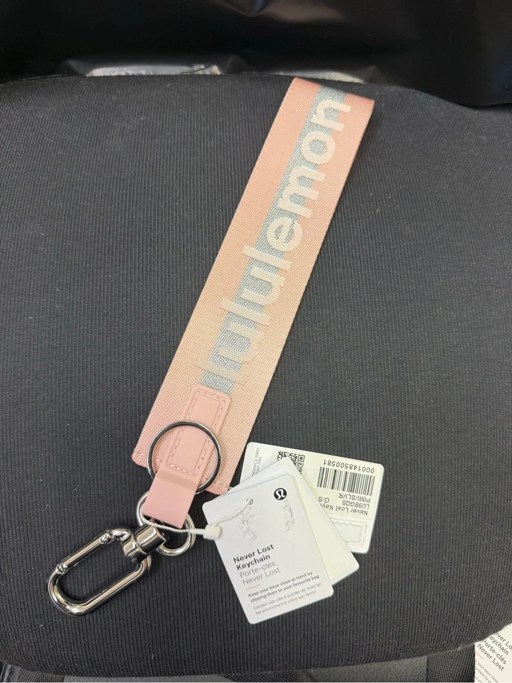Lululemon Pink, Silver, and White Never Lost Keychain